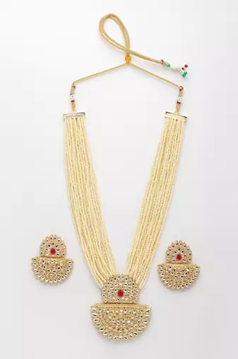  women's gold toned red stones & kundan studded jewellery set