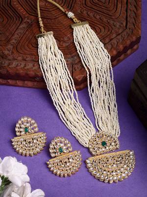  women's gold toned green stones & kundan studded jewellery set 1