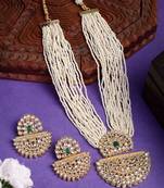  women's gold toned green stones & kundan studded jewellery set