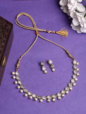  women gold plated pear shape kundan studded short jewellery set 1