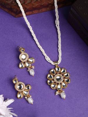  women gold plated kundan studded & pearls long jewellery set 1