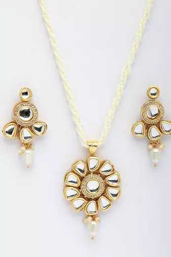 women gold plated kundan studded & pearls long jewellery set
