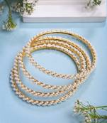 women set of 4 gold-plated pearls handcrafted traditional bangles
