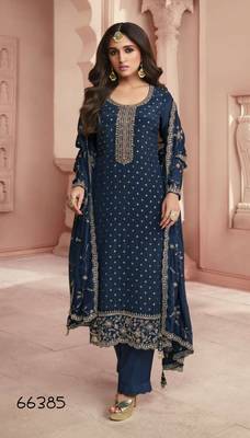Teal heavy embroidery dola silk semi stitched suits 1