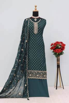 Teal heavy embroidery dola silk semi stitched suits 2