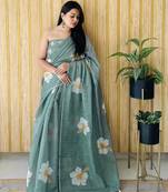 Light teal woven linen tassel saree with blouse piece