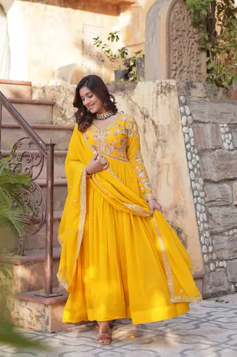 Yellow georgette embroidered ceremonial gown with dupatta