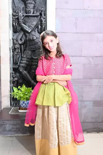Rani green brocade choli with gold skirt