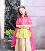 Rani green brocade choli with gold skirt