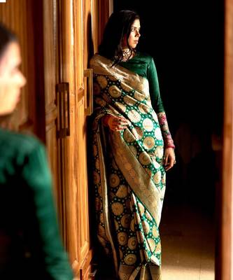 Green color silk blend saree with blouse 1