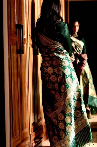 Green color silk blend saree with blouse