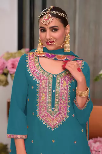 Rama green chinon fabric heavy zari and sequins embroidery work palazzo dress