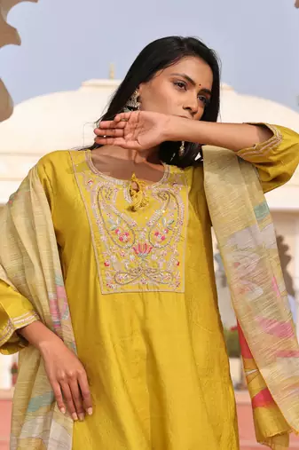 Yellow beautiful cotton silk fabric glamorous partywear readymade suit