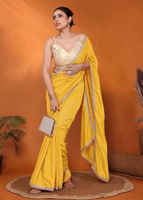 Yellow embellished pure georgette bollywood saree with blouse piece 1