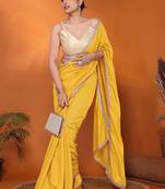 Yellow embellished pure georgette bollywood saree with blouse piece