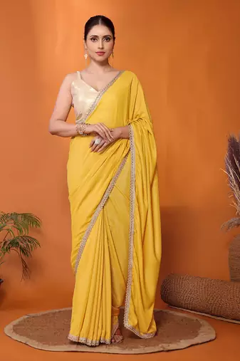 Yellow embellished pure georgette bollywood saree with blouse piece