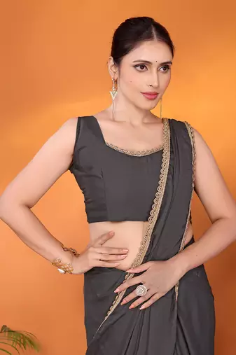 Grey embellished pure georgette bollywood saree with blouse piece