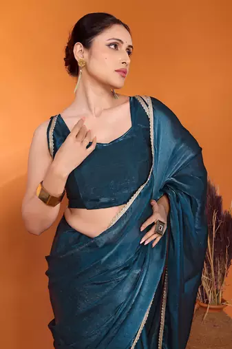 Teal embellished silk blend bollywood saree with blouse piece
