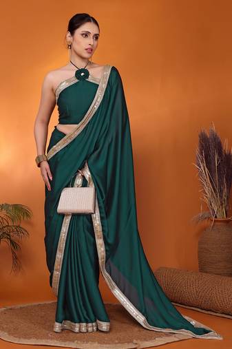 Green embellished pure silk bollywood saree with blouse piece