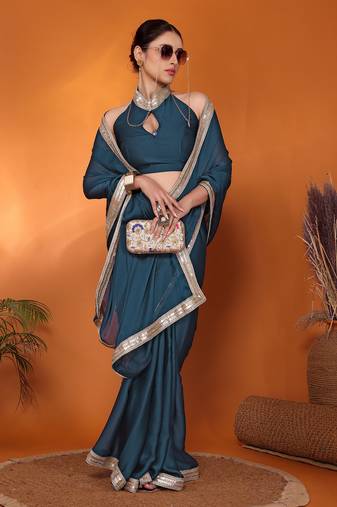 Teal embellished pure silk bollywood saree with blouse piece