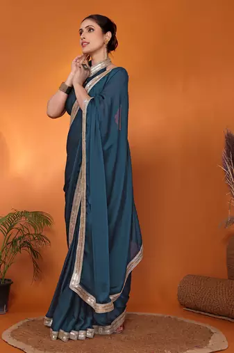 Teal embellished pure silk bollywood saree with blouse piece