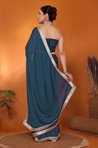 Teal embellished pure silk bollywood saree with blouse piece
