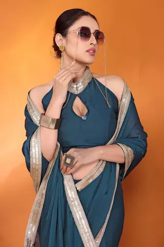 Teal embellished pure silk bollywood saree with blouse piece