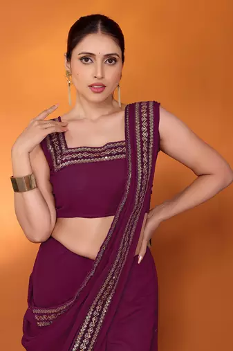 Purple embellished pure georgette bollywood saree with blouse piece