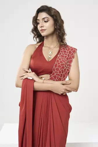 Rust orange drape saree set