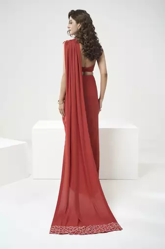 Rust orange drape saree set