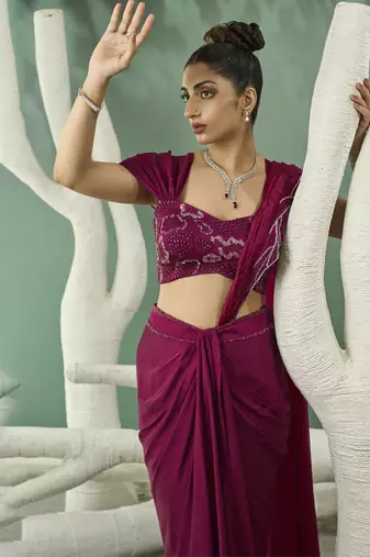 Plum pink drape skirt set with detachable dupatta