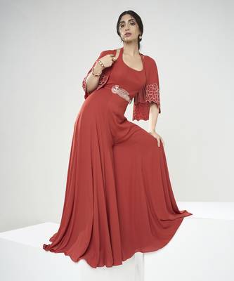 Rust orange jumpsuit with short cape 2