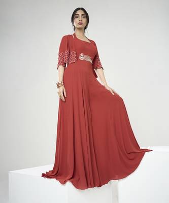 Rust orange jumpsuit with short cape 3