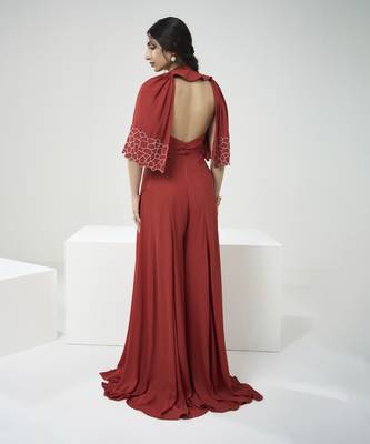Rust orange jumpsuit with short cape 5