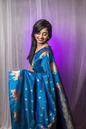 Teal blue wevon zari nandi moonga silk blend saree
