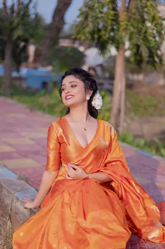 Orange wevon zari nandi moonga silk blend saree