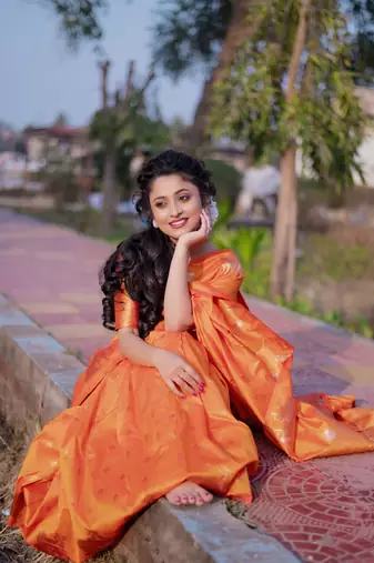 Orange wevon zari nandi moonga silk blend saree