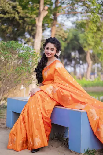 Orange wevon zari nandi moonga silk blend saree
