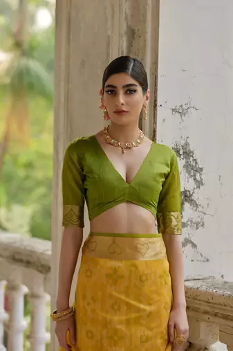 Yellow raw silk blend c wevon ikat ceremonial saree
