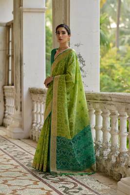 Green raw silk blend c wevon ikat ceremonial saree 2
