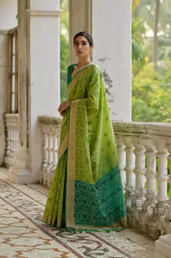 Green raw silk blend c wevon ikat ceremonial saree