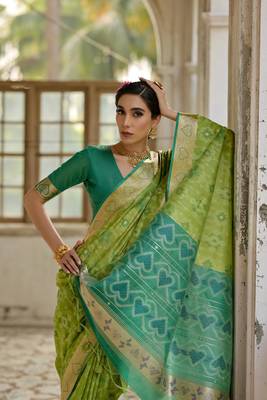 Green raw silk blend c wevon ikat ceremonial saree 3