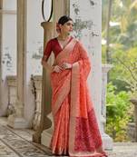 Rust raw silk blend c wevon ikat ceremonial saree