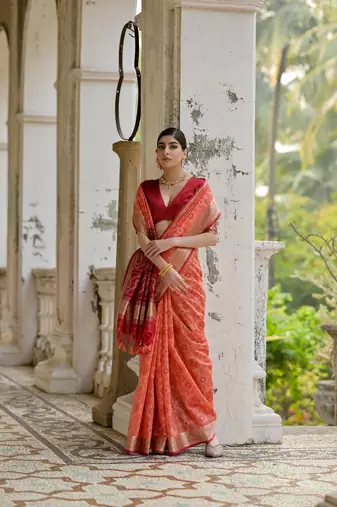 Rust raw silk blend c wevon ikat ceremonial saree