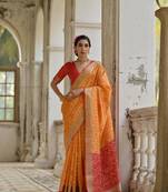 Mustard raw silk blend c wevon ikat ceremonial saree