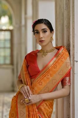 Mustard raw silk blend c wevon ikat ceremonial saree 3