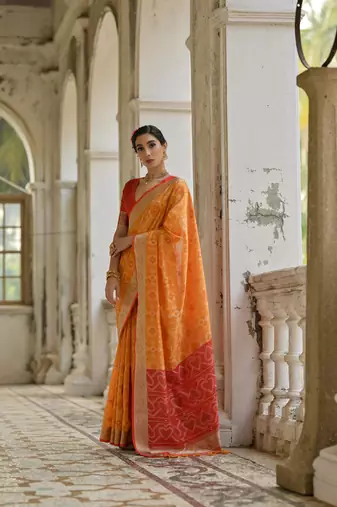 Mustard raw silk blend c wevon ikat ceremonial saree