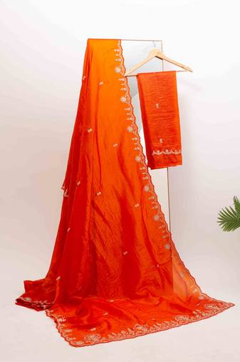 Orange embroidered crused tissue saree