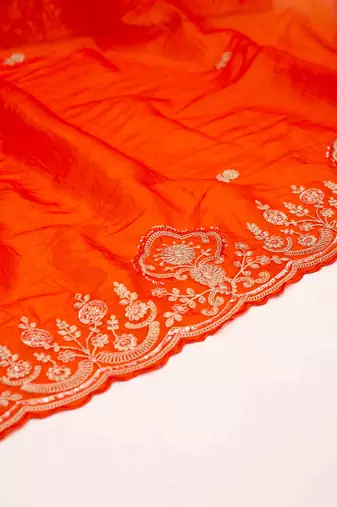 Orange embroidered crused tissue saree