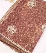 Brown embroidered net saree with blouse